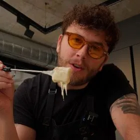 MOITIÉ-MOITIÉ CHEESE FONDUE WITH BLACK TRUFFLE